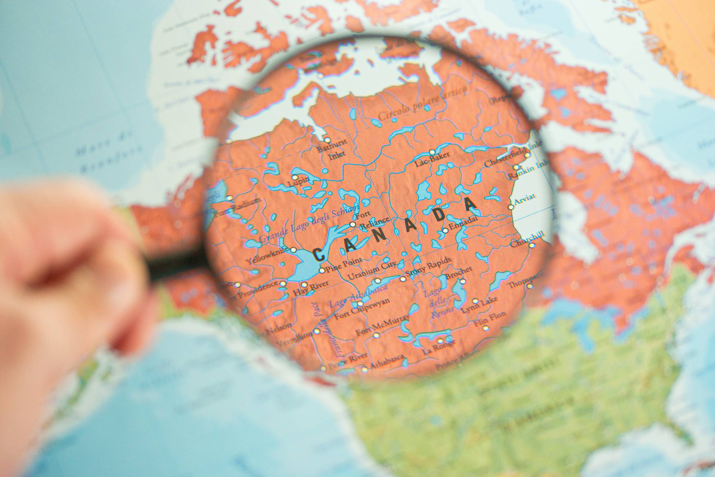 A Magnifying Glass Focusing On Canada