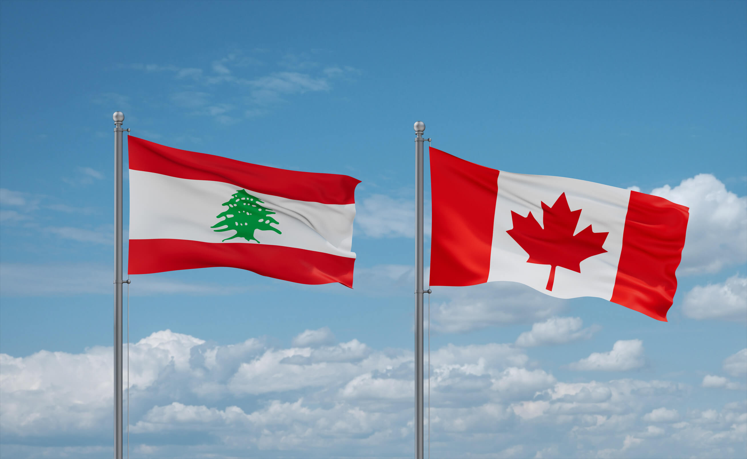 Canada And Lebanon Flags Waving Together