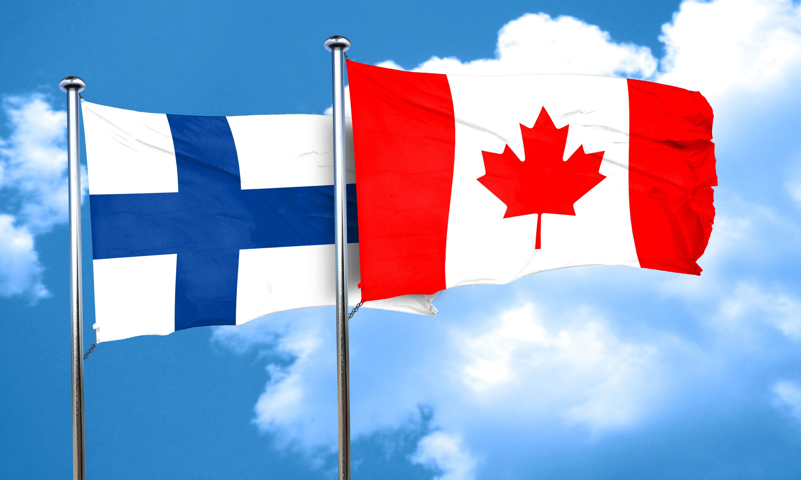 Canada Flag With Finland Flag Waved Together