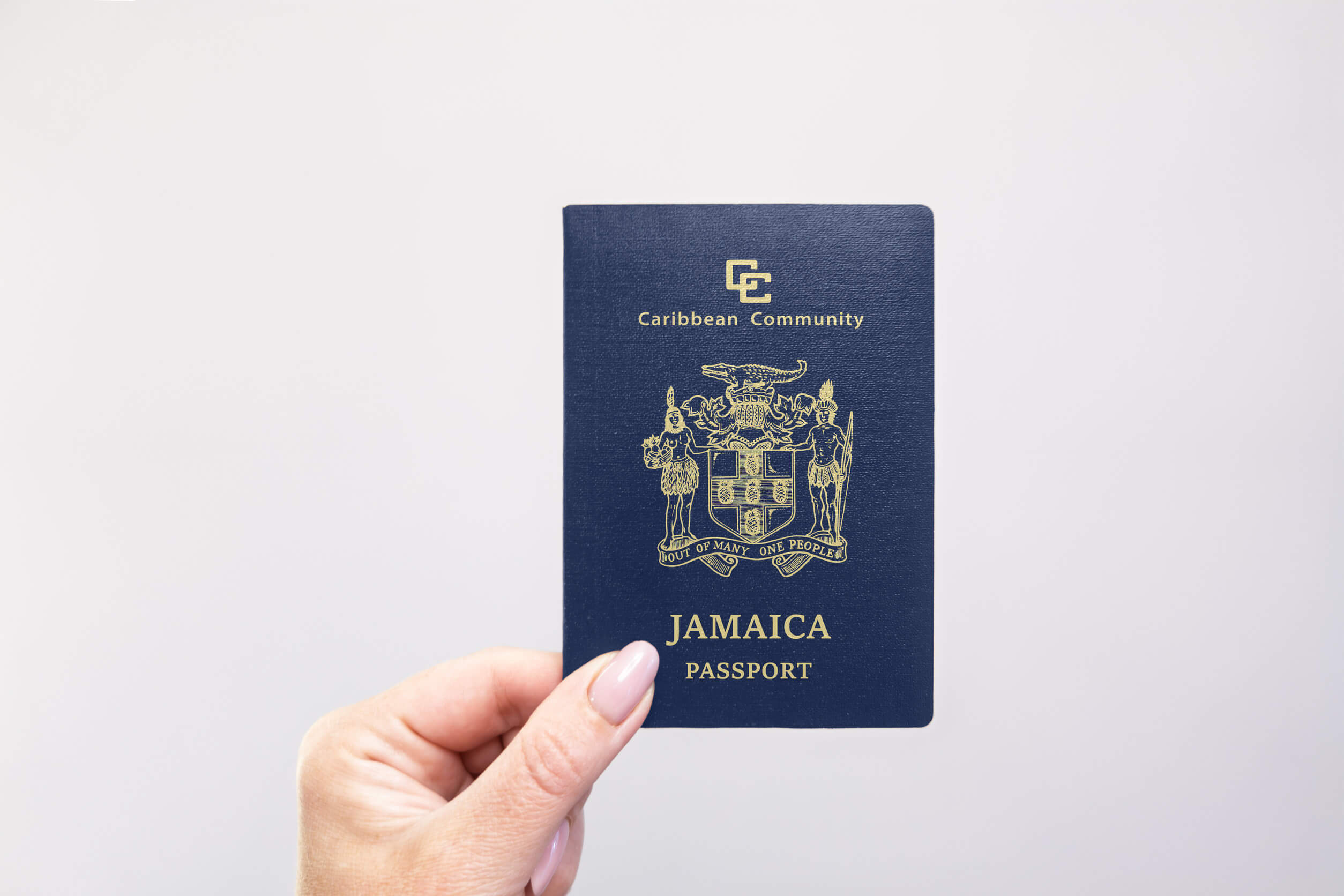 Close Up Of A Jamaica Held Passport In Hand
