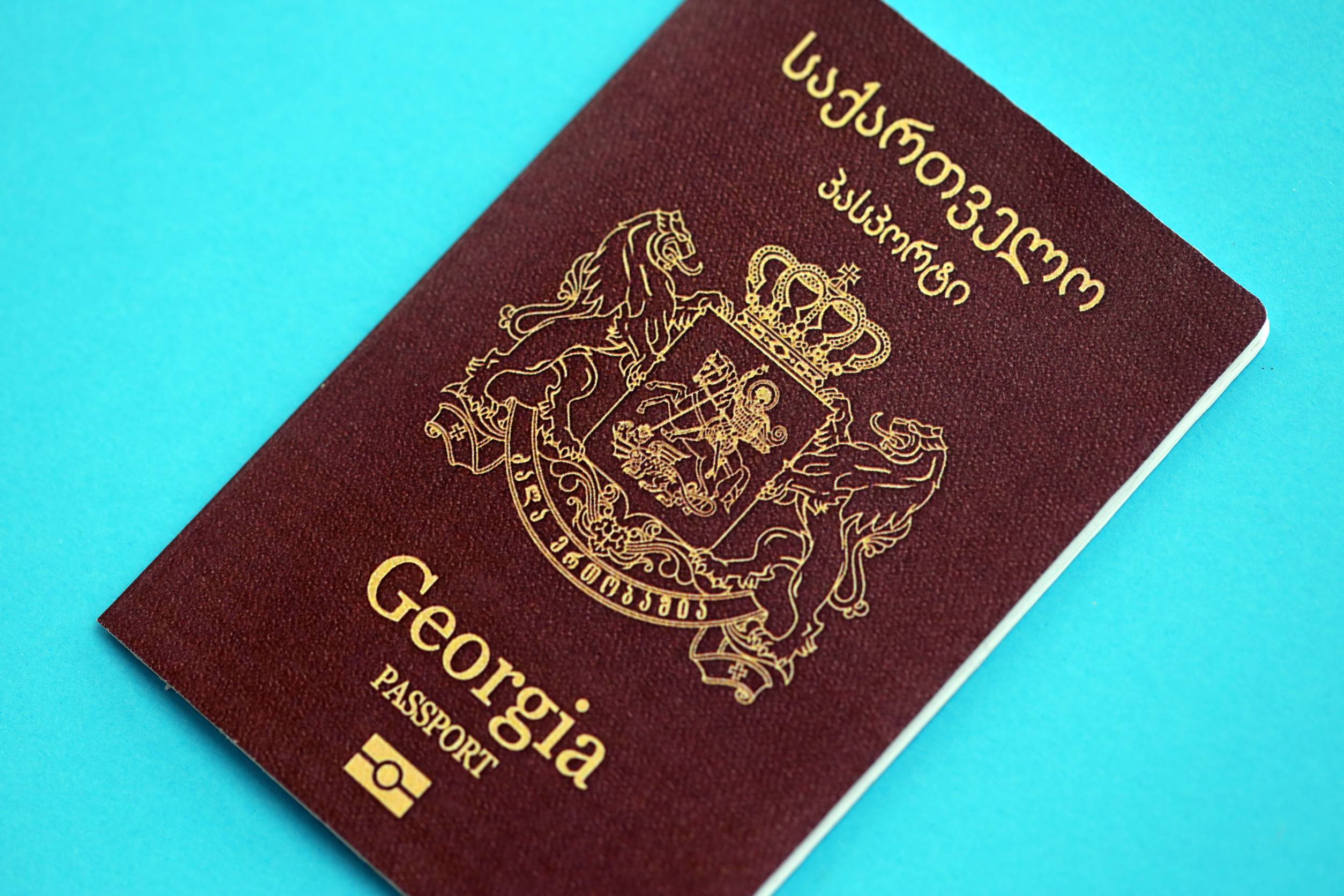 Georgian Passport Book On Light Blue Paper
