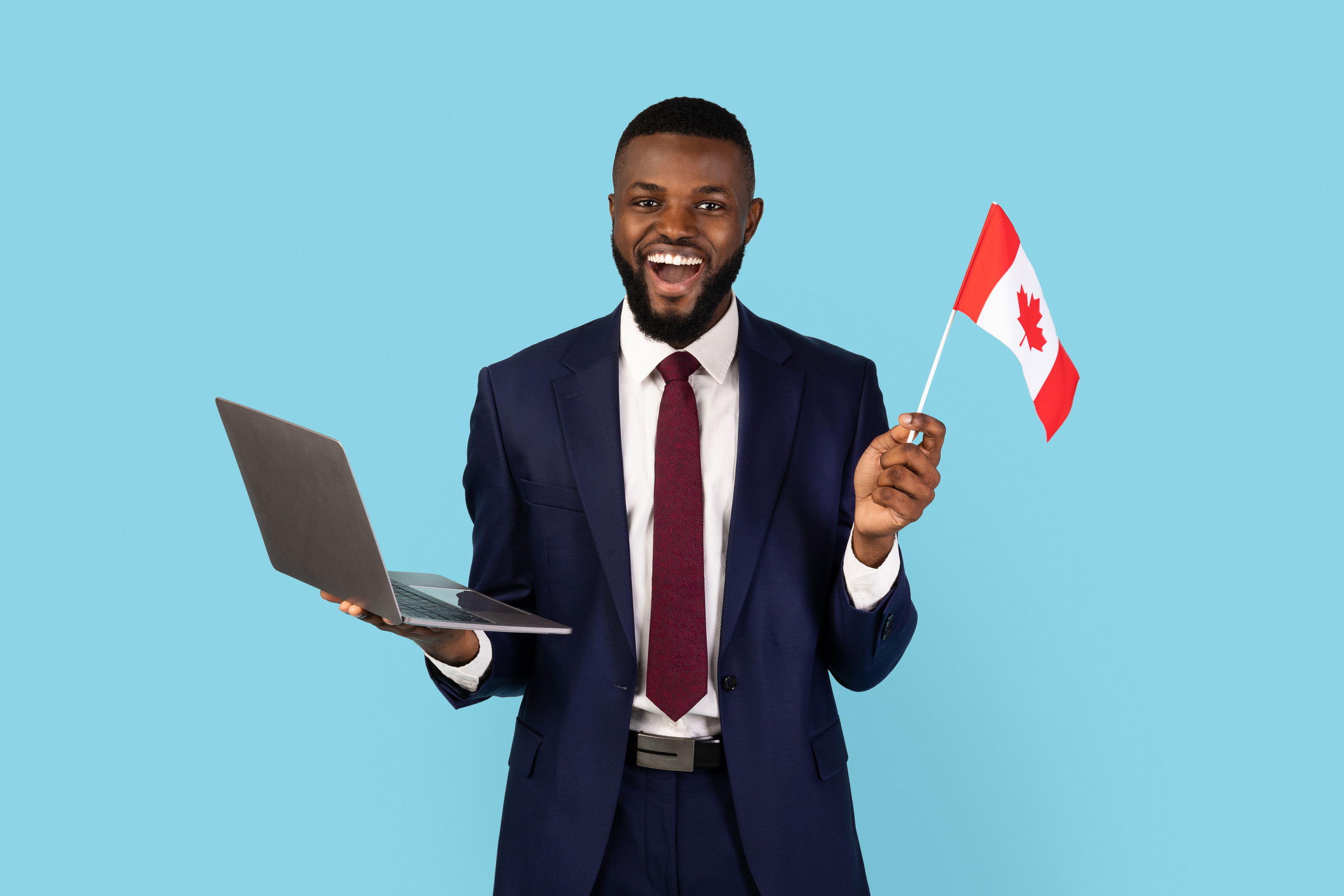 Guy Standing With A Canadian Flag