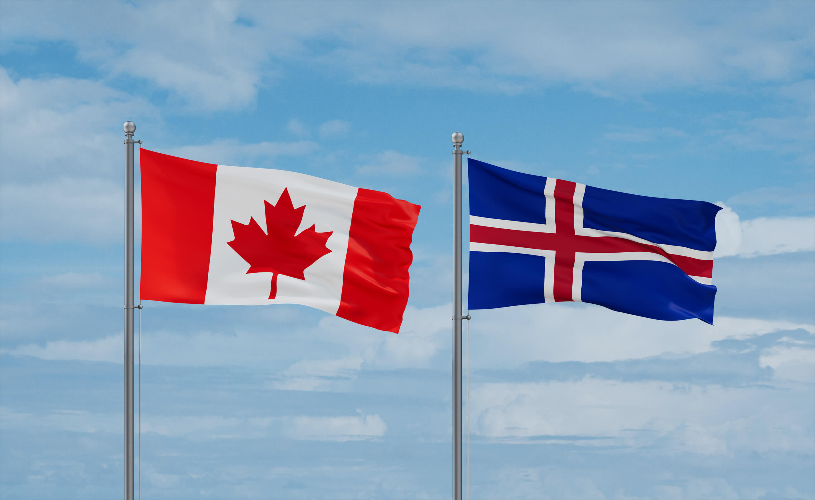 Iceland And Canada Flags Waving Together