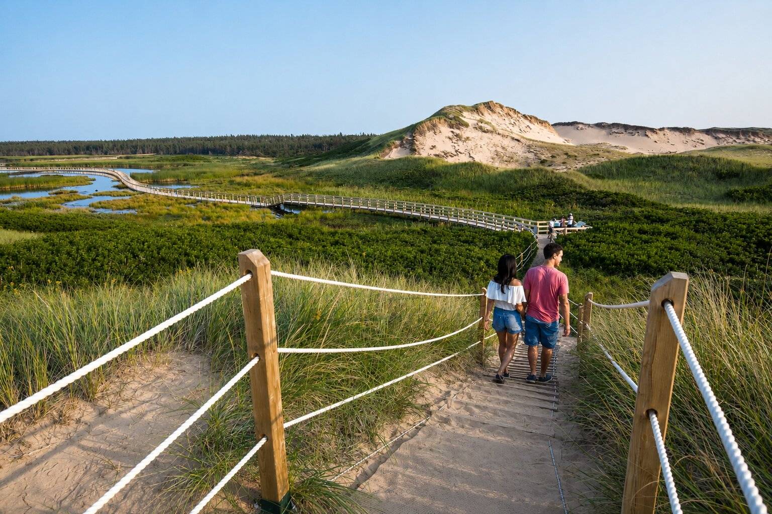 People walking down a pathway in Prince Edward Island National Park