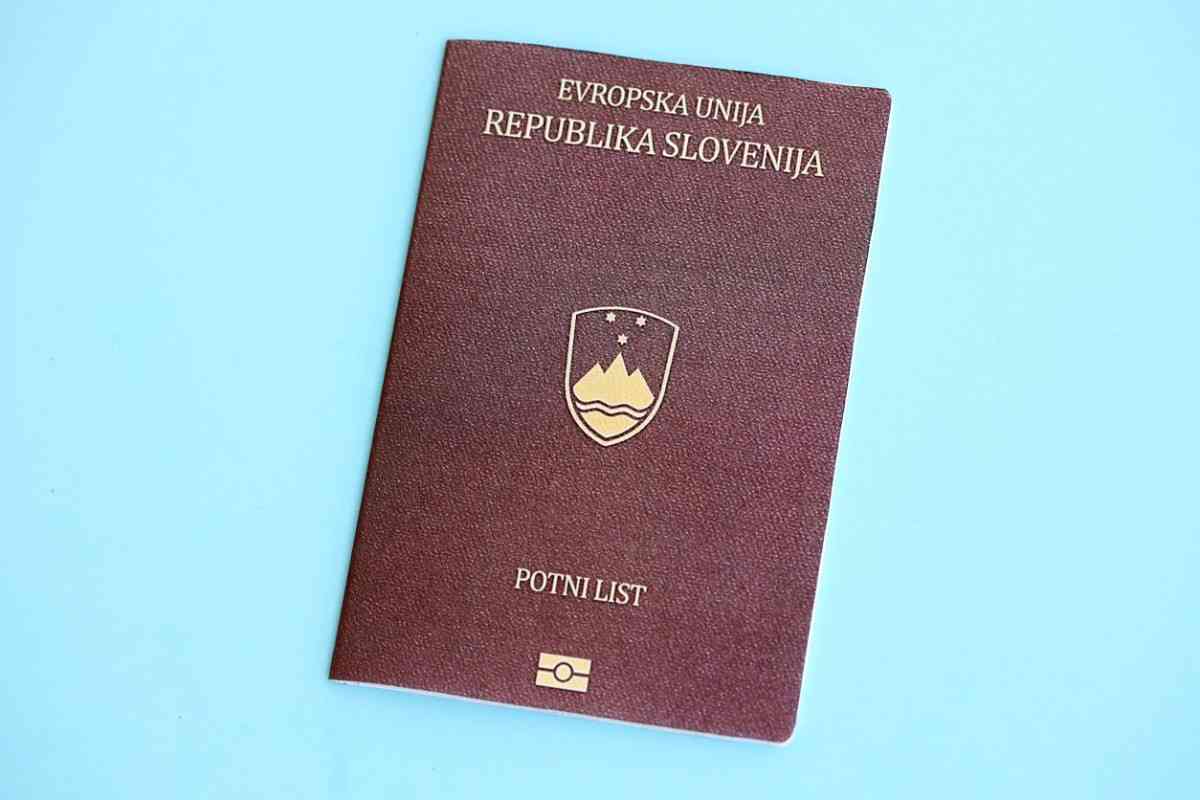 Slovenia Passport On Light Blue Paper