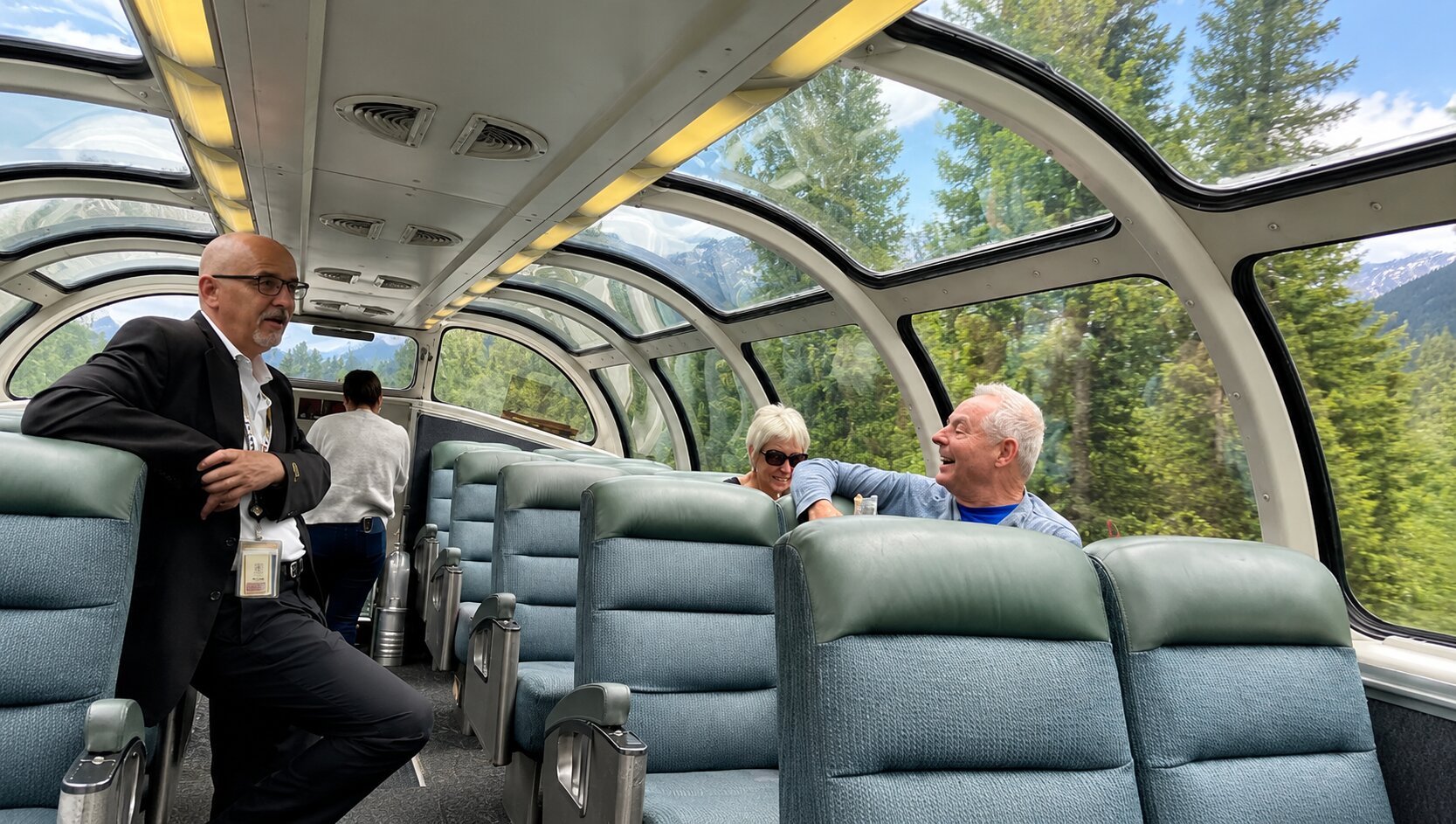 Travellers Interacting With Each Other Inside The Skeena Train