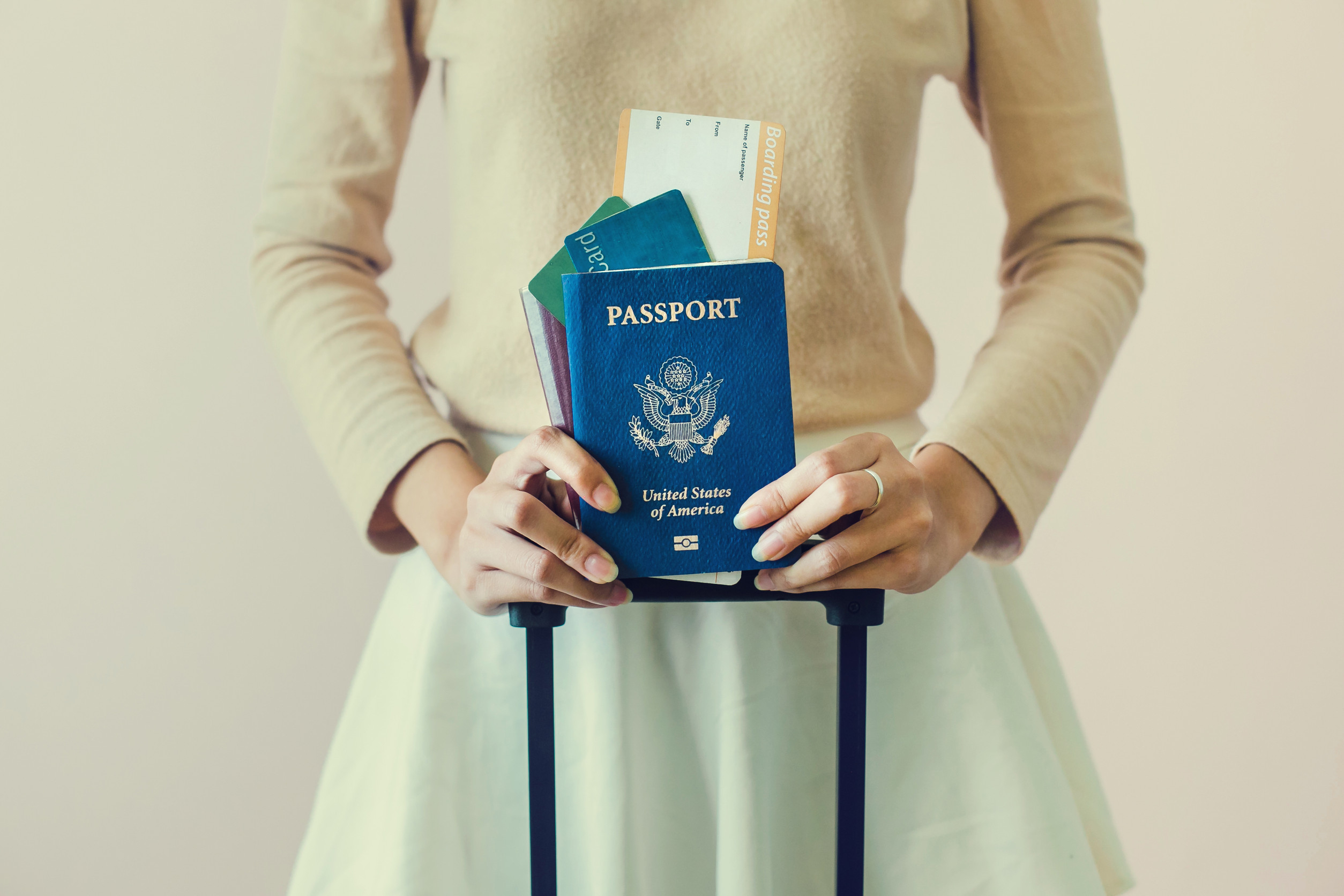Woman Holding Travel Documents